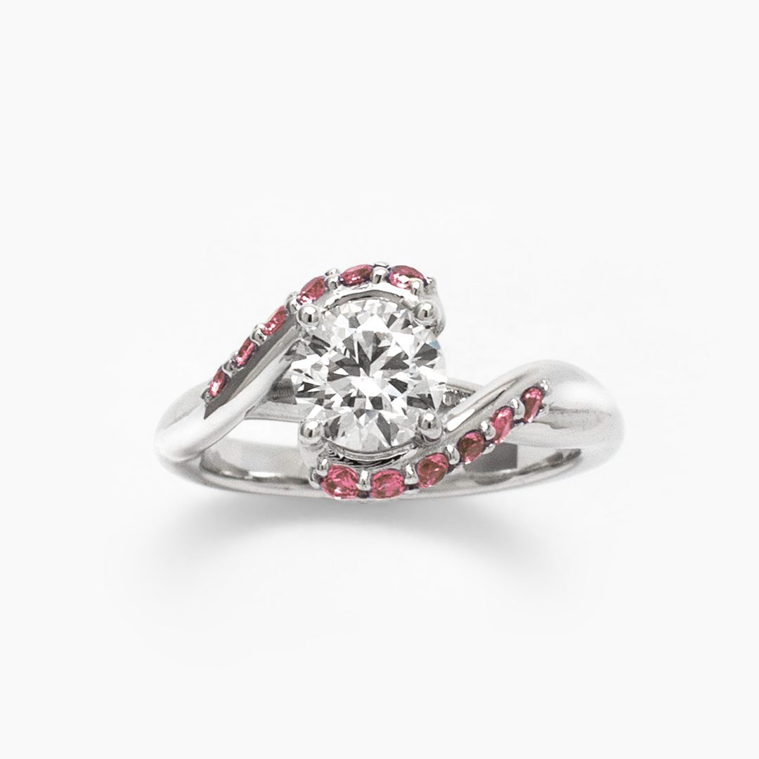 Anillo Bypass con Diamante y Zafiros Rosa